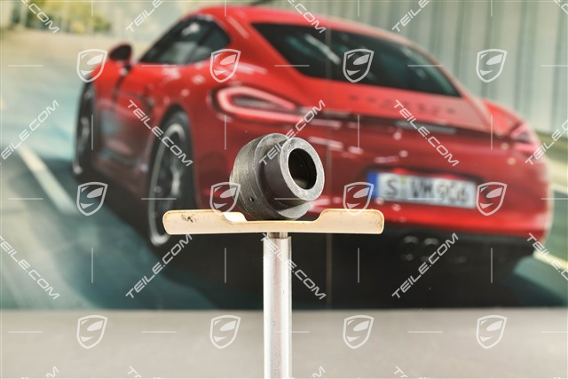Tensioning element for headlight mounting