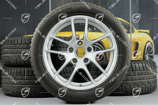 18" komplet kół zimowych "Cayman", felgi 8J x 18 ET57 + 9J x 18 ET47 + opony zimowe Pirelli SottoZero2 N0 235/45 R18 + 265/45 R18, z czujnikami ciśnienia