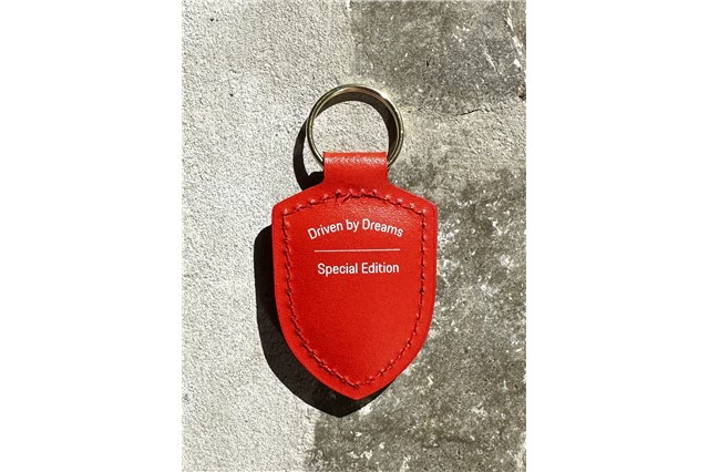 Crest Keyring "Driven by Dreams" – 75Y, lavaorange